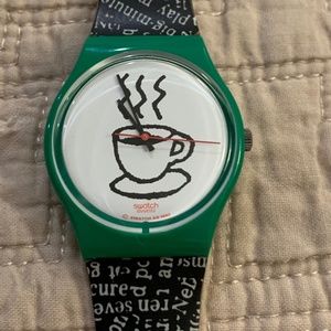 Vintage.. very collectible.. Coffee Swatch watch..works well.   FIRM